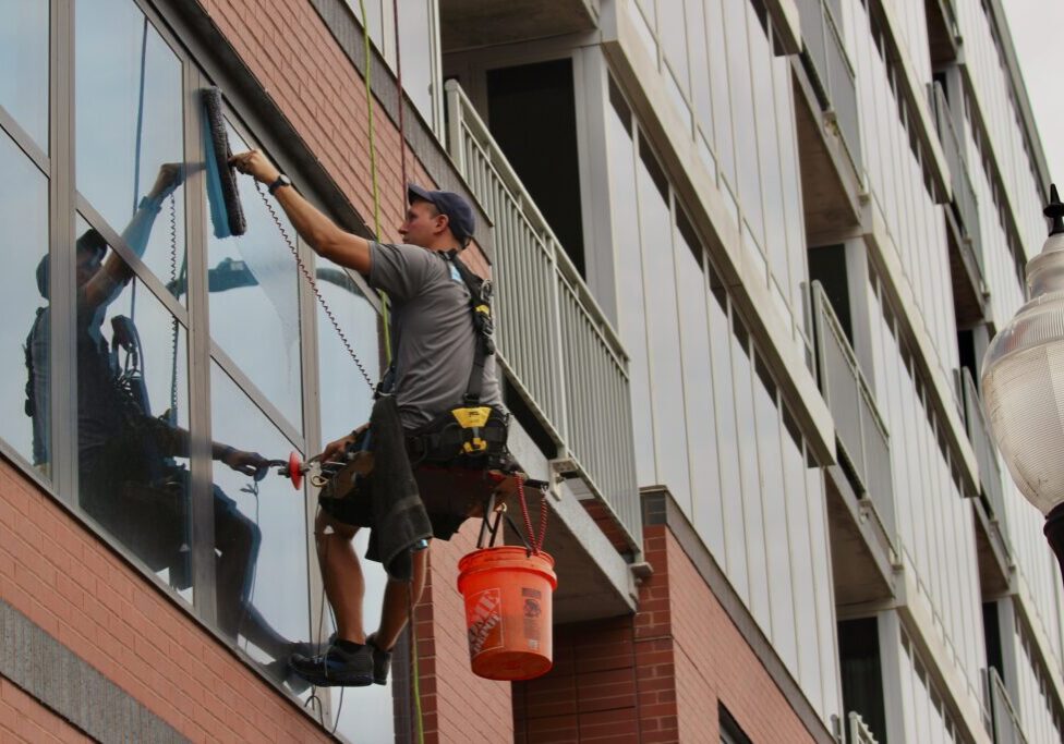 Photo of technician on high-rise building